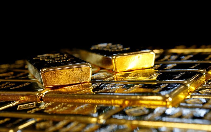 Gold falls below $1,900 level as U.S. dollar, yields rise