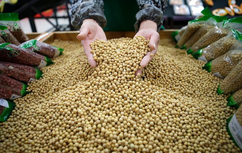 China, facing high corn prices, buys more from U.S